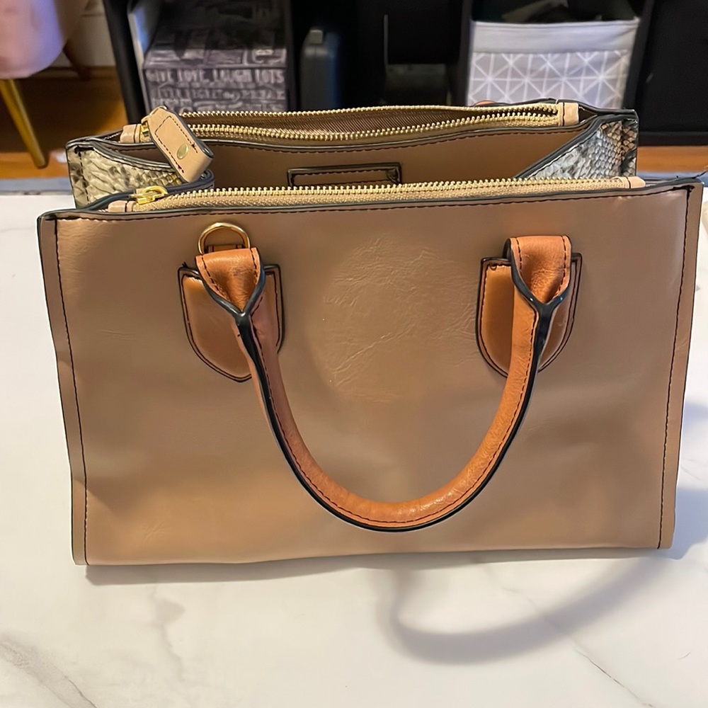 Tan purse with snakeskin print